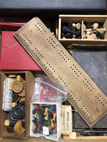 Lot 136 - A selection of games boards, chess pieces, draughts sets, cards, etc, one box.