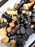 Lot 204 - Box of antique and later wooden chess pieces, various shapes, styles and sizes.