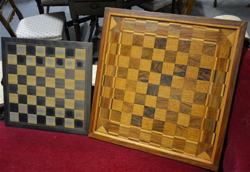 Lot 177 - A hardwood chess board, 46x46cm, and another similar, 61x61cm, (2).