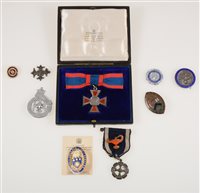 Lot 340 - The Red Cross Faith, Hope and Charity Medal 1883, GRI issue with red and blue ribbon in a fitted Garrard & Co box, other nursing badges, Inner Wheel, The Girls' Guildry.