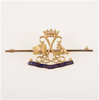 Lot 267 - A Scottish sweetheart brooch, "The Argyll & Sutherland Highlanders" the 50mm long bar with applied crest marked 9ct