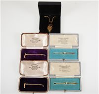 Lot 269 - Four bar brooches in original boxes, a 60mm yellow and white metal crop brooch marked 9ct, another similar 55mm, two 55mm bar brooches with a 4.3mm cultured pearl to centre