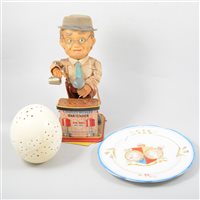 Lot 124 - Royal Commemorative mugs etc, a decorated ostrich egg, ephemera, cased travelling wine set, and a tin plate toy "Charley Weaver Bartender"