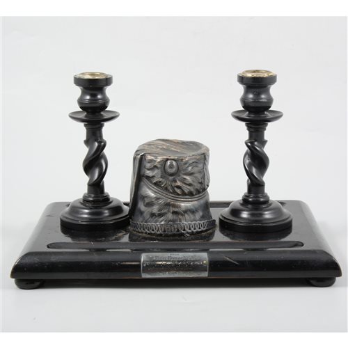 Lot 70 - A Victorian ebonised ink stand with silver busby inkwell by S Smith & Son, engraved plaque to front "From Major George Luck to Sergeant Major Henry Merrick"