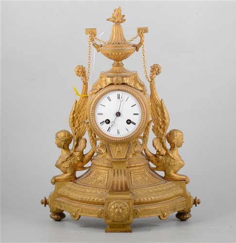 Lot 142 - 19th Century French gilt spelter mantel clock, the case with urn finial, circular enamelled dial, cylinder movement striking on a bell, 41cm.