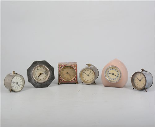 Lot 147 - A small Continental metal cased table clock, enamelled case, 7.5cm and five other small timepieces, (6).