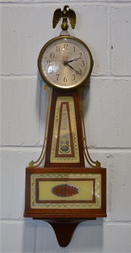 Lot 132 - Seth Thomas, electric wall clock, French case with eagle finial, 73cm.