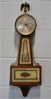 Lot 132 - Seth Thomas, electric wall clock, French case with eagle finial, 73cm.