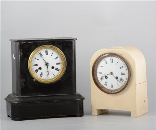 Lot 137 - Mantel clock, black painted case, the movement striking on a gong, 26cm and another clock in a painted case, French cylinder movement striking on a bell, 23cm, (2).