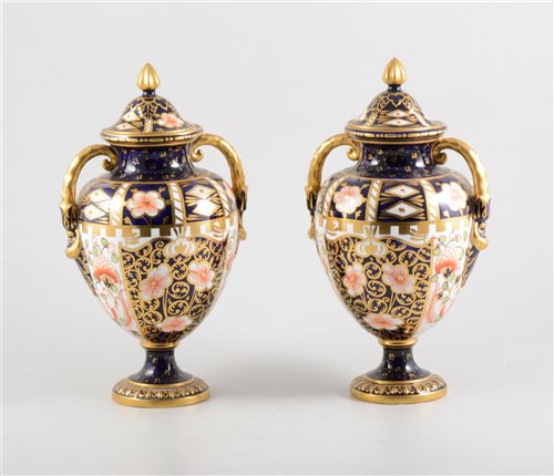 Lot 6 - Royal Crown Derby pair of ovoid vases, twin handles and covers.