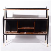 Lot 616 - A Mid-Century teak and black lacquered bookcase