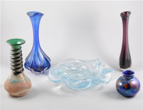 Lot 17 - Orrefors glass dish, ribbon moulded form, clear glass, diameter 33cm; blue tinted moulded glass bud vase; another tinted glass bud vase.
