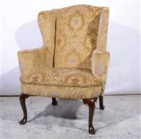Lot 353 - George III style wing back armchair, shaped arms, bowfront seat, cabriole legs, pad feet, 81cm.