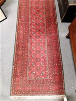 Lot 427 - Afghan red ground runner.