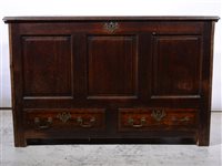 Lot 357 - Joined oak mule chest, 18th Century and later, hinged boarded top, two drawers, width 125cm, depth 54cm, height 79cm.