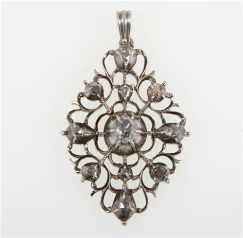 Lot 250 - A white metal pendant set with ten old rose cut diamonds, open scroll work, navette shaped 40mm x 26mm, unmarked, white metal testing as silver.
