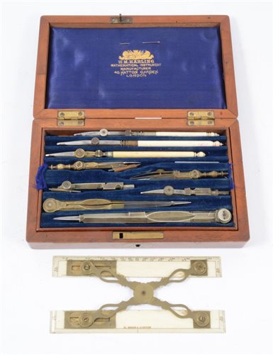 Lot 145 - M.Berge, London, rare ivory and brown adjustable rule; together with a W.H. Harling Geometry set in mahogany case.
