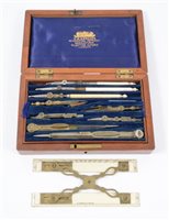 Lot 145 - M.Berge, London, rare ivory and brown adjustable rule; together with a W.H. Harling Geometry set in mahogany case.