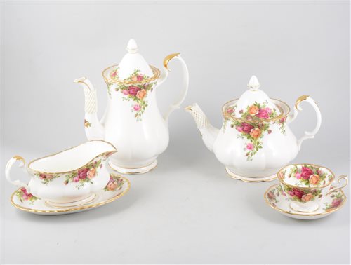 Lot 81 - A Royal Albert Old Country Roses tea and dinner service for 6, plus some spare pieces, cutlery set, coasters, etc