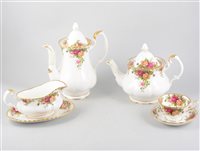 Lot 81 - A Royal Albert Old Country Roses tea and dinner service for 6, plus some spare pieces, cutlery set, coasters, etc