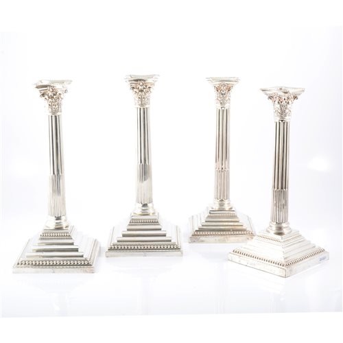 Lot 161 - A matched set of four Victorian Corinthian column candlesticks
