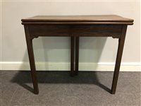 Lot 377 - A Victorian mahogany foldover card table.