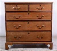 Lot 379 - George III oak chest of drawers, rectangular to with a moulded edge, two short above three long graduating drawers, bracket feet, width 102cm, depth 51cm, height 102cm.