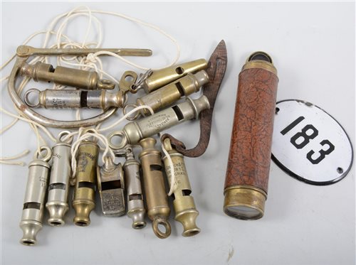 Lot 229 - Collection of police whistles, enamel plaque 183 and a small telescope.