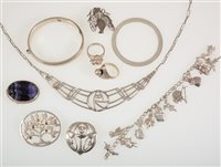 Lot 339 - Ten items of silver and similar jewellery to include a Tree of Life brooch, 10.5mm half hinged bangle, an oval blue john brooch 30mm x 22mm