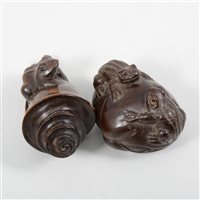 Lot 200 - Two Japanese carved wood netsukes, each carved with toads (2)