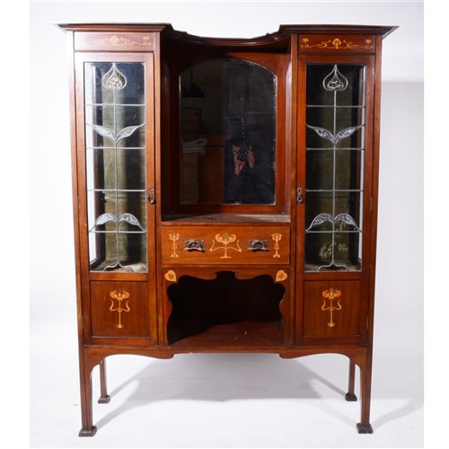Lot 516 - An English Art Nouveau mahogany and inlaid display cabinet.