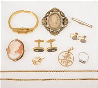 Lot 274 - A collection of jewellery, a modern oval carved shell cameo brooch in a 9 carat yellow gold mount, 40mm x 35mm, a Turler gold-plated cocktail bangle watch