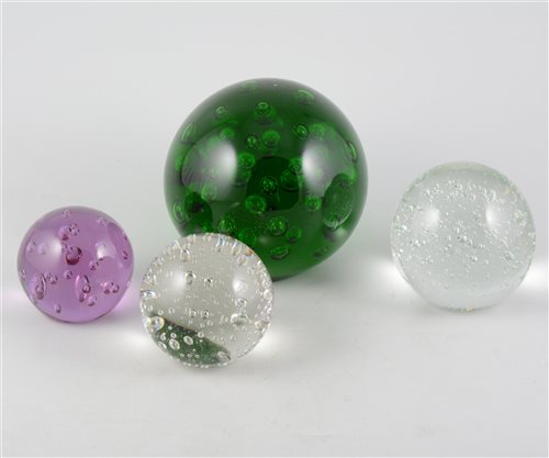 Lot 37 - Five glass bubble paperweights, with controlled bubble design, various sizes. (5)
