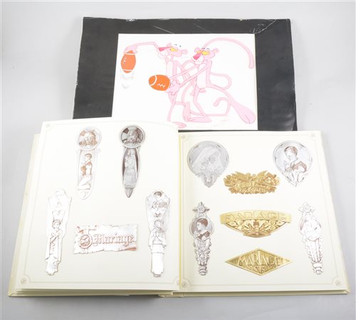 Lot 95 - A Pink Panther animation art cell; and a folder of embossed card samples (2)