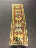 Lot 432 - A Kilim runner