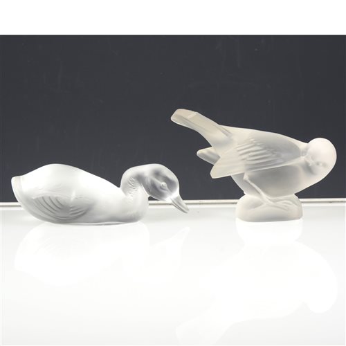 Lot 25 - A Lalique Crystal frosted glass paperweight of a Sparrow; and similar frosted glass paperweight of a duck feeding. (2)
