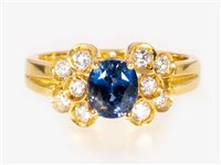 Lot 168 - A sapphire and diamond "butterfly" design cluster ring
