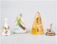 Lot 95 - A box of decorative china and glass items, including Lilliput Lane cottages, a Leonardo Collection 'West Highland Terrier' figure, a 'Cottage Rose' ceramic bell, two Silver Anniversary teacups and...