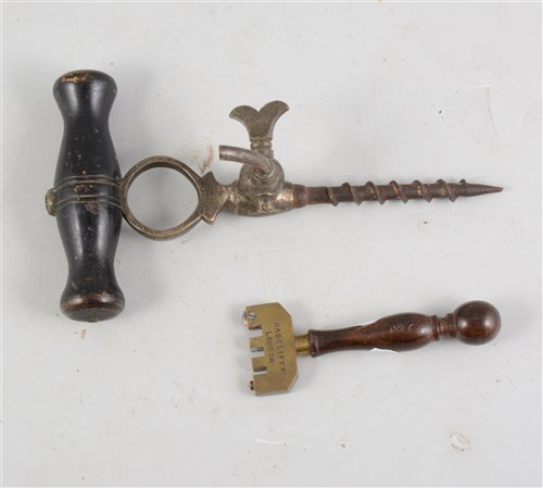 Lot 129 - Champagne tap with wooden handle and glass cutter. (2)