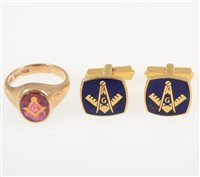 Lot 236 - A 9 carat yellow gold masonic signet ring with a synthetic red stone set into the head with the masonic emblem, ring size R, gross weight approximately 8.2gms
