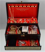 Lot 354 - A large jewel box of costume jewellery to include a pendant and chain marked 750 approximate weight 3.6gms, - brooches, necklaces, earrings, bangles, two wrist watches, etc