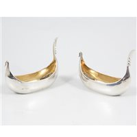 Lot 360 - A pair of silver boat-shaped salts by Holland, Aldwinckle & Slater, London 1906