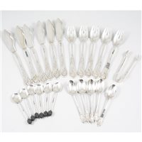 Lot 371 - Six Continental white metal fish knives and five matching forks, marked 800