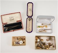 Lot 344 - A collection of tie bars, cufflinks, a 9 carat gold stud, a memorial stick pin with black border and oval hair compartment to centre in a fitted box.