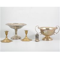 Lot 140 - A silver half fluted twin handled trophy by Walker & Hall, Sheffield 1916, 12cm high, 21.5cm at widest point, 10.7oz; and other silver and silver-plated wares.