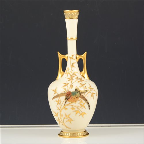 Lot 13 - A Royal Worcester Persian-shape twin handled vase.