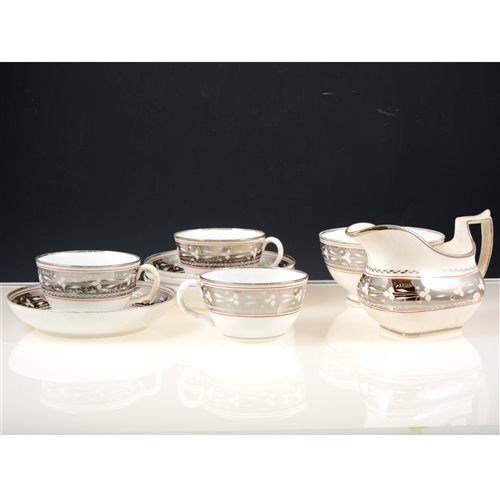 Lot 21 - Staffordshire silver lustred part tea service, circa 1820, silver resist banding with floral motifs.