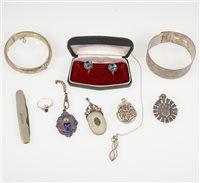 Lot 342 - A silver hollow half hinged bangle 12.5cm wide, Birmingham 1990, a pair of butterfly wing earrings, medallions, metal pen knife etc.