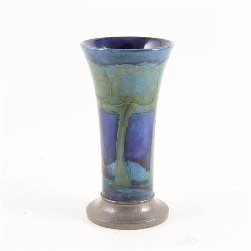 Lot 529 - William Moorcroft for Liberty & Co, Moonlit Blue, a flared vase with Tudric pewter base.