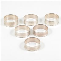 Lot 189 - A set of six napkin rings by Charles Horner Ltd, Chester 1917, two large are 1.9cm high, four small are 1.5cm high, total weight approx. 1.8oz. (6)
